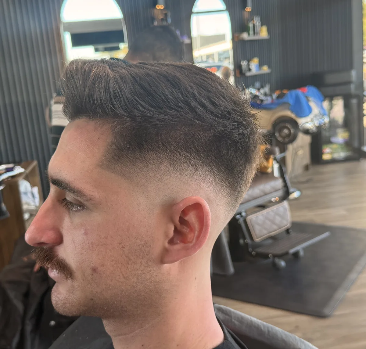 Scissor cut and beard detail at Textured Barber Lounge
